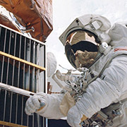 Solar Max satellite repair. Several metal louvers and thermal blankets were returned 
									from the Solar Max satellite. Returned surfaces are a source of information on sub-millimeter 
									sized orbital debris. Credit: NASA.
